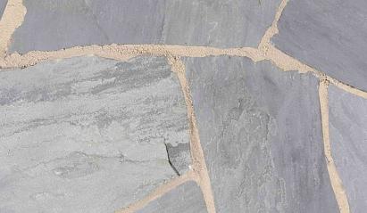 Flagstones Kandla Grey, ca. 25-40 mm dik horizontaal verpakt, ca. 4-7 stuks per m2.